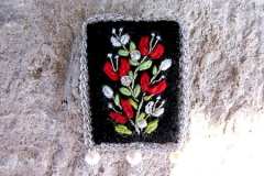 24_island_red_brooch_